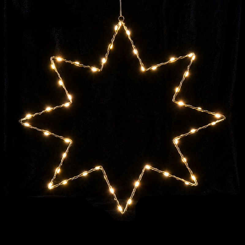 Lumière suspendue de Noël en forme d'étoile rayonnante
